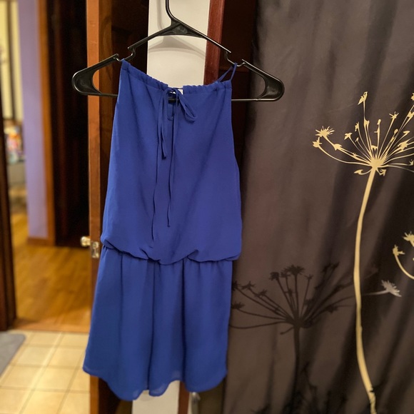 Woman’s bright blue romper with attached necklace - Picture 7 of 7